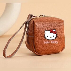Brown Hello Kitty Mini Bag Coin Purse Wristlet with Zipper Closure.